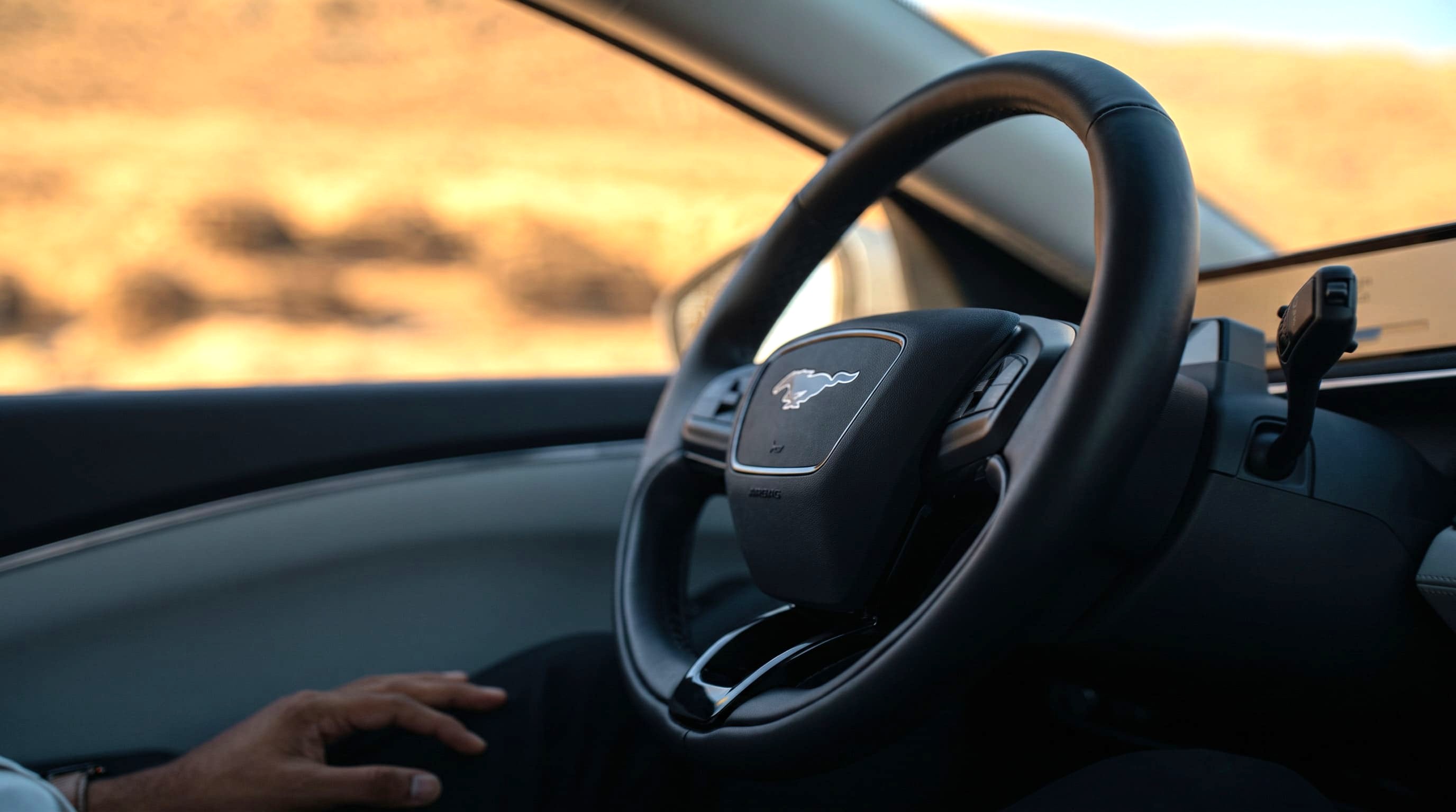 Driver display showing lane keeping and adaptive cruise engaged at highway speed
