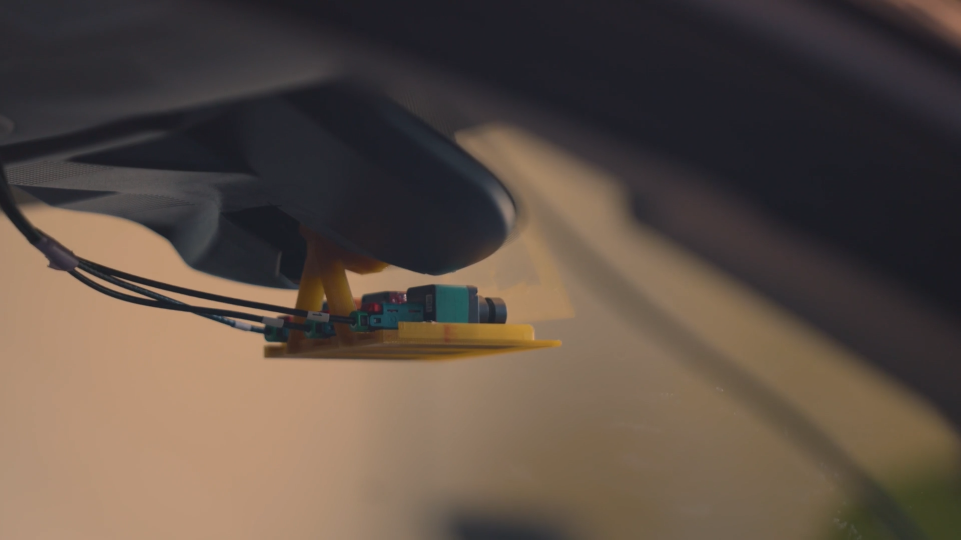 Camera installed behind rearview mirror on any vehicle